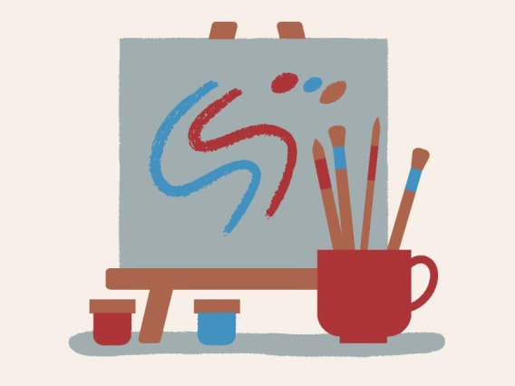 Canvas on easel with a cup holding paintbrushes