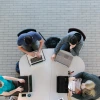 View from above of students studying on laptops in McClelland Hall