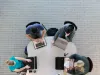 View from above of students studying on laptops in McClelland Hall